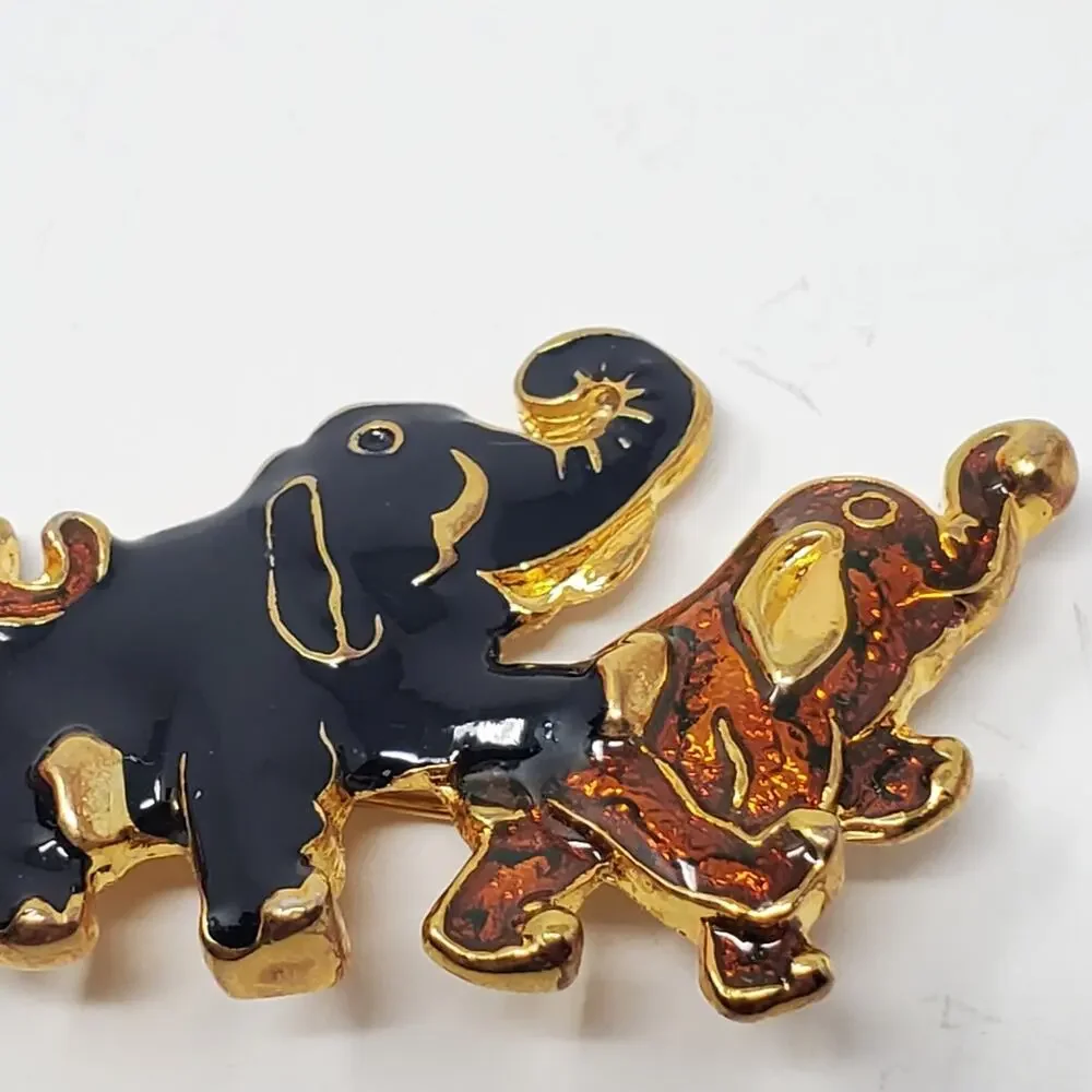 Vintage Gold tone & Enamel walking elephant brooch Great condition